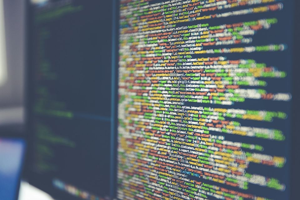 Colorful lines of code on a computer monitor